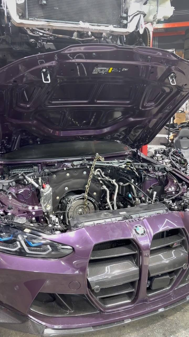 Purple BMW M4 engine bay